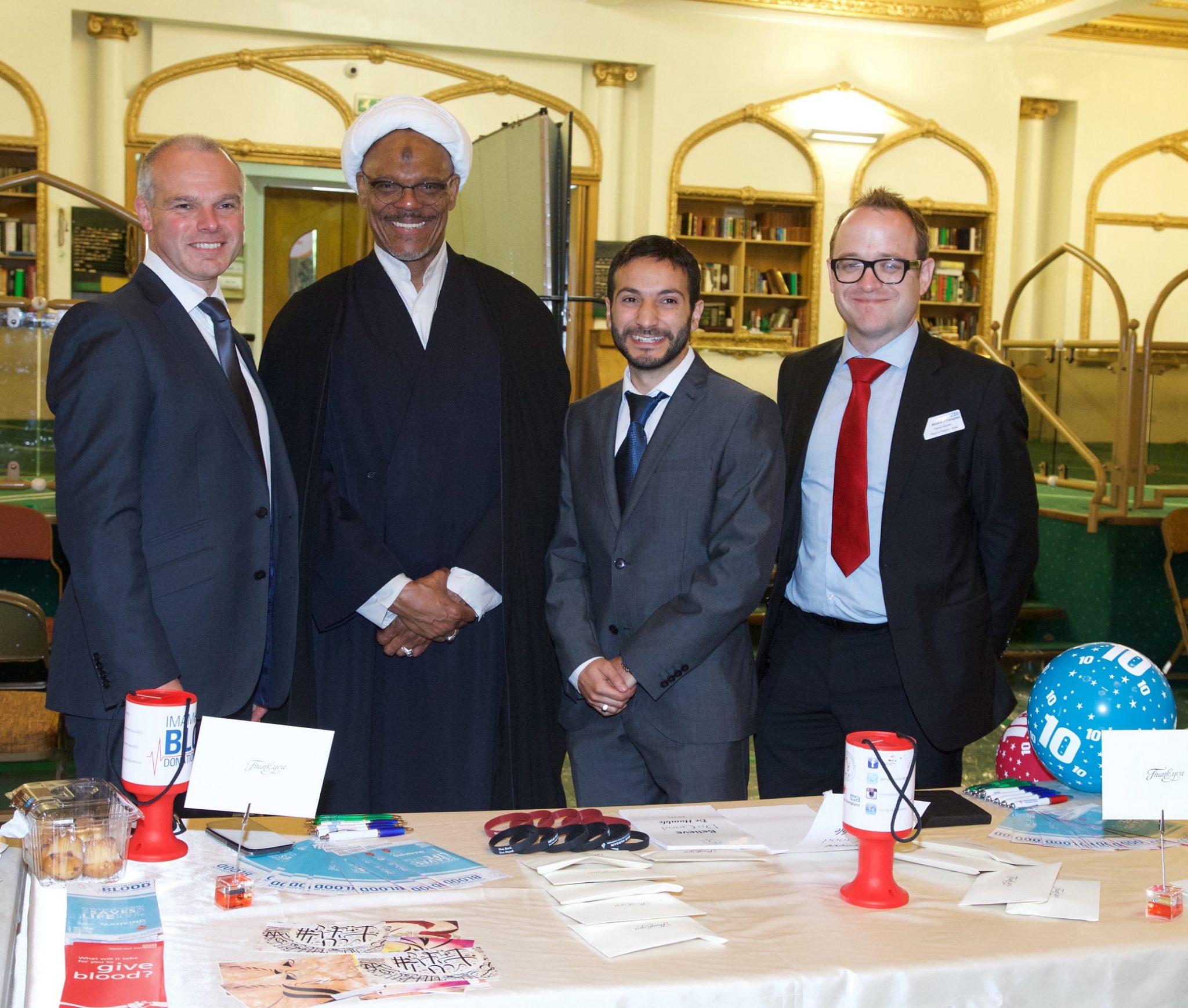 L-R: Mike Stredder, Director of Blood Donation at NHS Blood and Transplant; Sheikh Ahmed Haneef, Islamic Centre of England; Aimen Al Diwani, Coordinator, Imam Hussain Blood Donation Campaign; Darren Bowen, Head of Region at NHS Blood and Transplant
